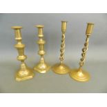 A pair of C19th brass ejector candlesticks, together with a pair of brass open barley twist