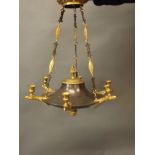 A bronze and gilt brass Empire style six branch chandelier with eagle's head sconces, 19" x 22"