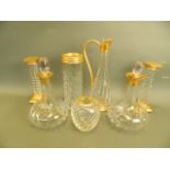 A collection of seven pieces of Continental glass items with gilt collars and fittings, comprising