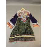 An Afghan silk and bead work wedding dress, 45" long