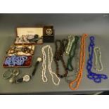 A collection of costume jewellery to include earrings, beads, watches etc