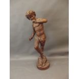 A large late C18th/early C19th carved pine figure of Pan standing on a conch, 54" high
