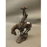 A bronze figure 'Prayer to the healing spirit', signed McCain, 17" high