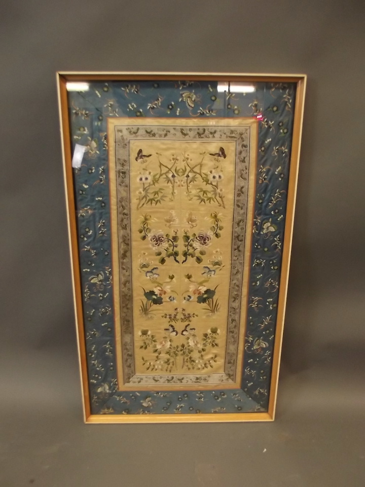 A late C19th Chinese silk embroidery of butterflies amongst flowers, 16" x 28"