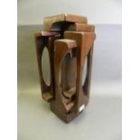 An abstract varnished wood sculpture, signed in pencil to base 'Brian Willsher 1979', 20" high