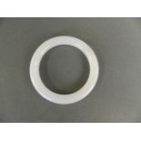 A white jade bangle, 3" diameter