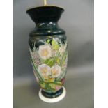 A large Continental porcelain vase decorated with flowers, converted to a lamp base, 16½" high