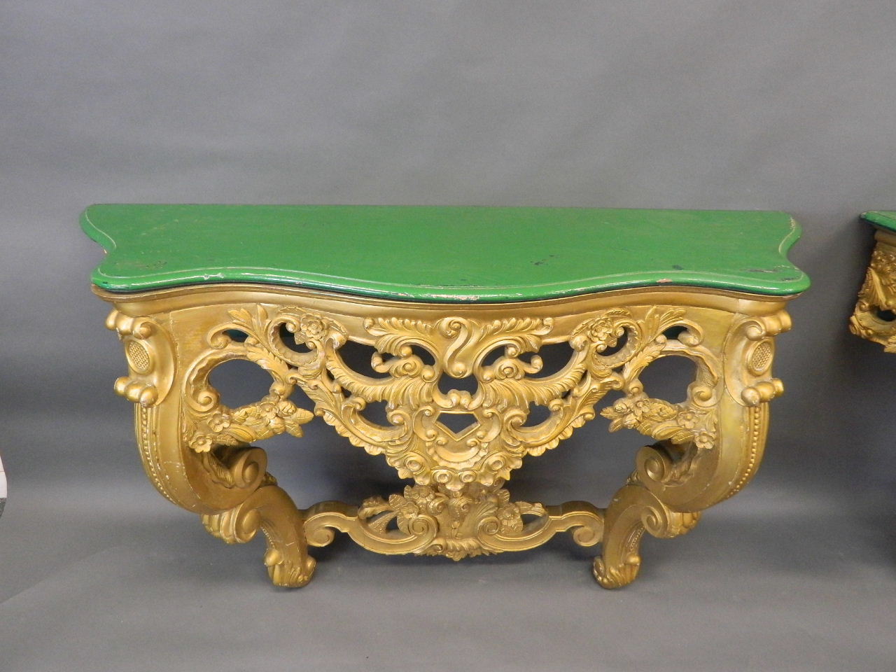 A pair of giltwood console tables with serpentine shaped and carved painted tops, 55" x 18" x 33" - Image 3 of 4