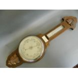 An oak cased aneroid banjo barometer, 32" long