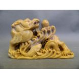 A Chinese soapstone carving of a dragon and carp, 4" long