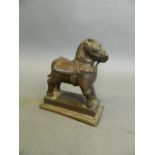 A Chinese bronze scroll weight in the form of a horse, 3" long