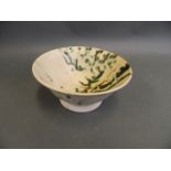 A studio pottery bowl with splash glazed decoration, 6½" diameter