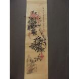 A Chinese watercolour scroll depicting a bush bearing berries, 13½" x 53"