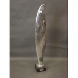 A chromed model of a propeller blade, mounted on a marble base, 38" high