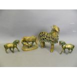 A collection of Eastern lacquered bronze animals to include two Indian ceremonial cows, and a pair