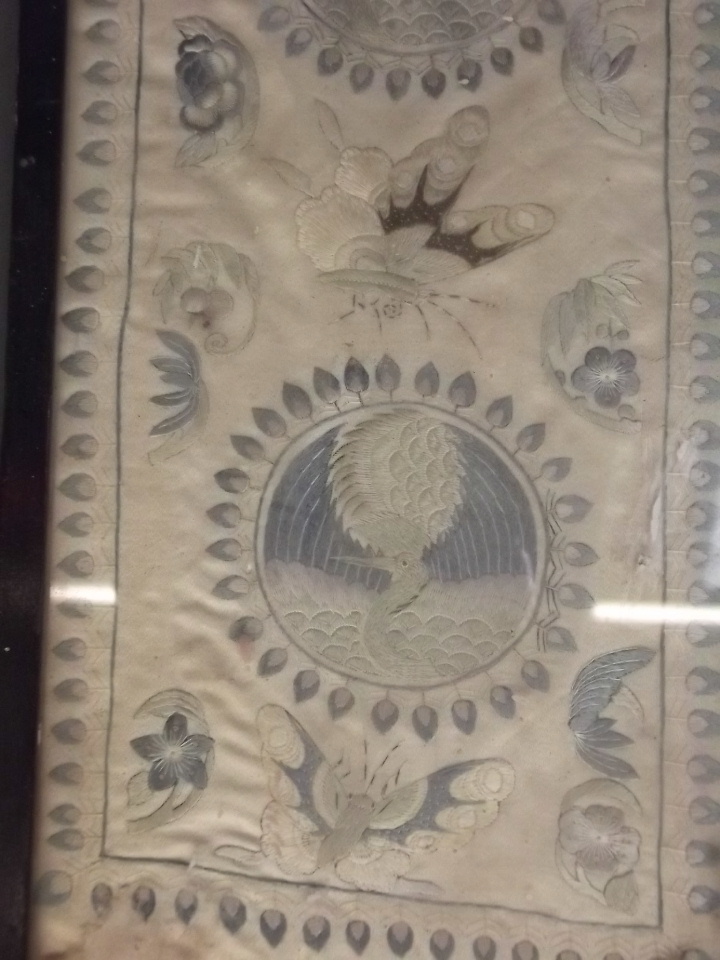 An Oriental embroidered silk border decorated with roundels depicting exotic birds, 5½" x 40" - Image 2 of 3