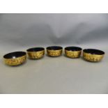 A set of five Thai black lacquer potpourri bowls with gilt scrolling foliate decoration, 5" diameter