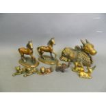 A collection of Eastern cold lacquered bronze figures in the form of a ceremonial cow, horses,