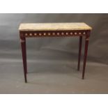 A French style mahogany and brass mounted console table with marble top and frieze comprising