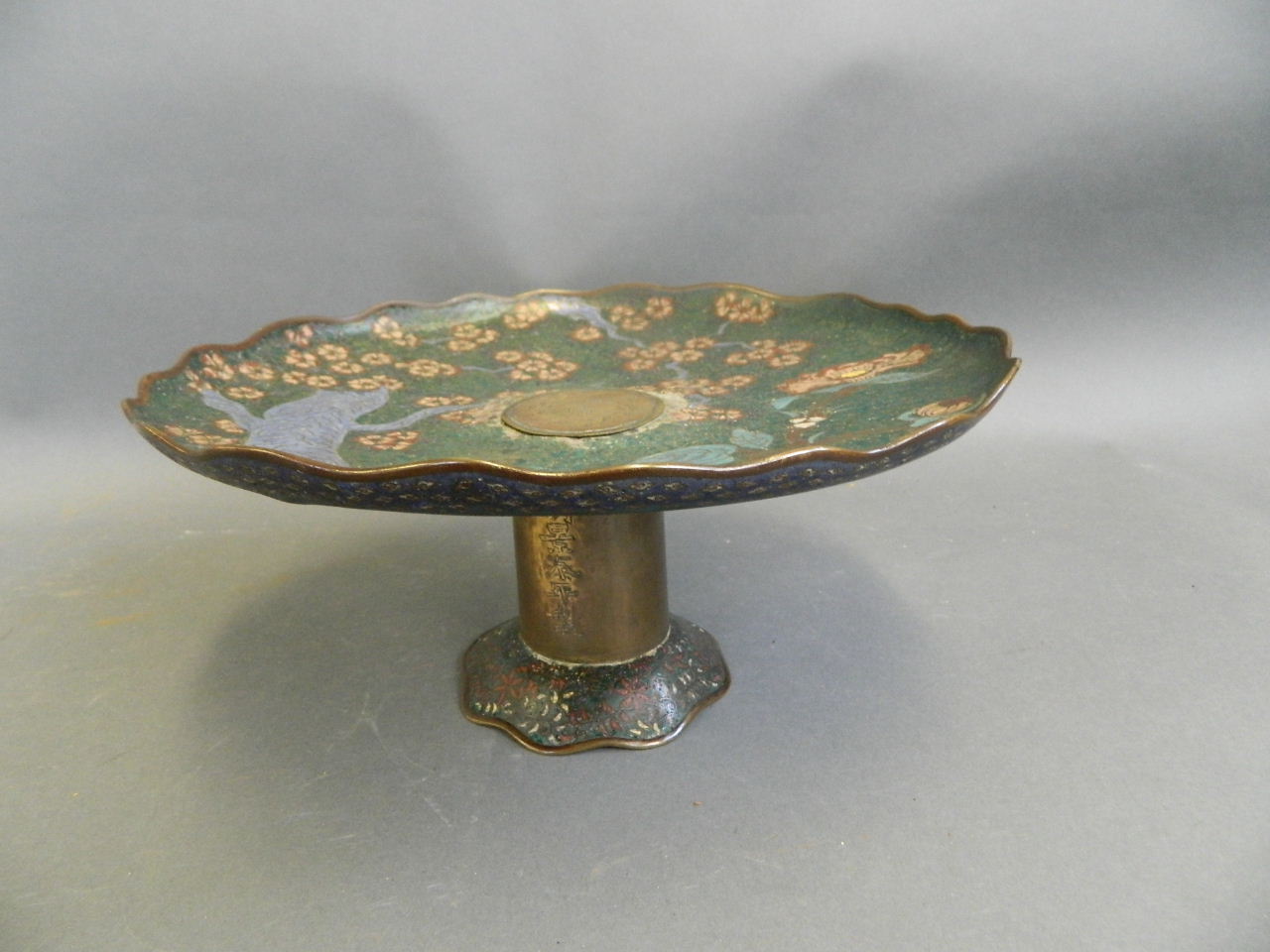 A Chinese cloisonné cake stand with prunus tree and floral decoration, on a brass stand with 6 - Image 2 of 3