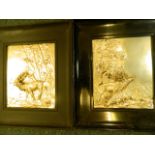 A pair of framed embossed and applied silver plated plaques of stags in landscapes, 8" x 9½"