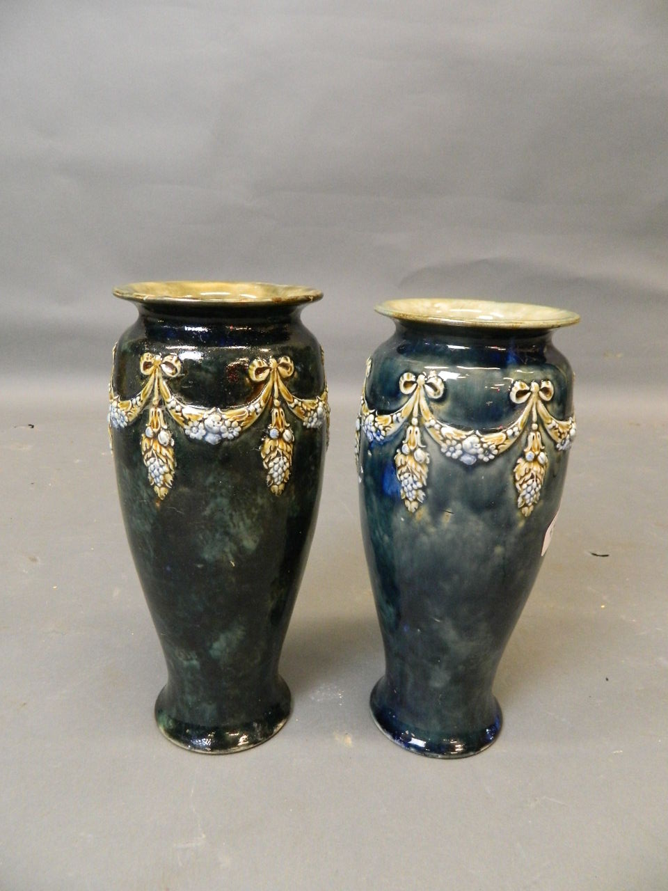 A matched pair of Royal Doulton vases, 10½" high