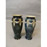 A matched pair of Royal Doulton vases, 10½" high