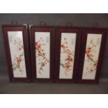 A set of four Chinese polychrome enamel porcelain panels depicting insects amongst autumnal