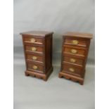 A pair of C19th mahogany four drawer bedside chests with moulded panelled sides and drawers,