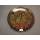 A Poole pottery charger decorated with a galleon, marked to base 'S. Aegean', signed 'D. Brogan',
