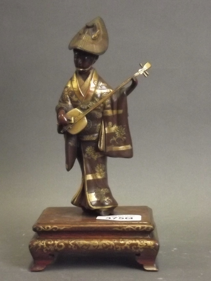 A fine Japanese Meiji period Miyao bronze figure of a woman playing a shamisen, with gilt - Image 2 of 2