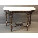 A C19th ebonised and parcel gilt console table with crossed stretchers and undertier, and marble