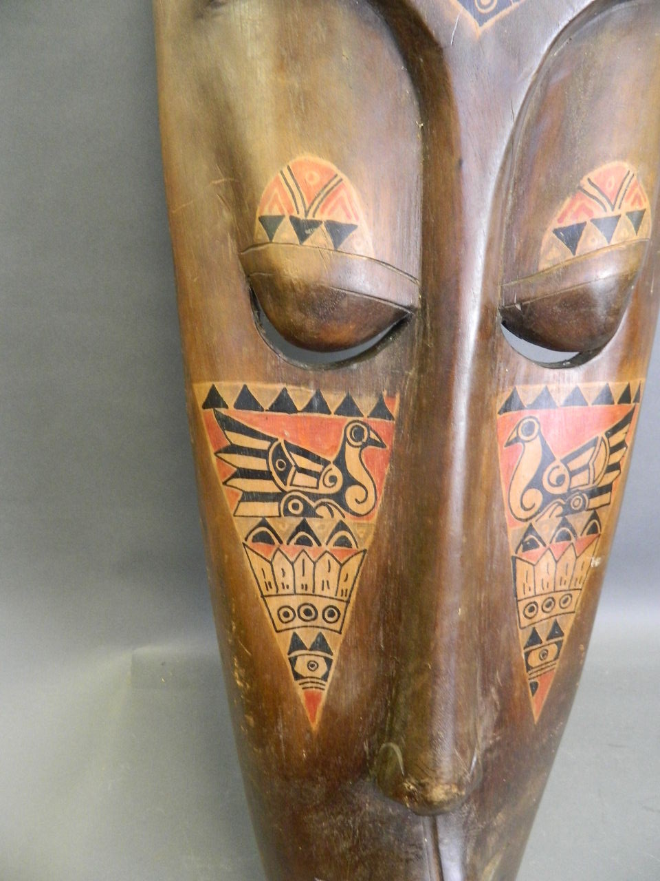 A large African carved wood wall mask with painted animal decoration, c1950, 9½" x 40" - Image 3 of 3