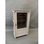 A C19th Continental painted pine display cabinet with decorative sign work to glass, 13" x 25" x 43"