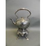 A Sheffield silver plated spirit kettle with chased and engraved vine and swag decoration,