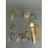 A quantity of assorted costume jewellery comprising 18ct gold plated wristwatch, chains, pendants