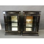 A pair of C19th ebonised pier cabinets with brass mounts and bone inlaid decoration with penwork