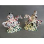 A pair of C19th Portobello figures of riders on horseback decorated in bright enamels, 6½" high
