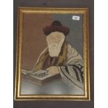 A gilt framed tapestry depicting a bearded scholar, 15" x 20"