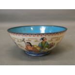 A Cantonese enamelled copper bowl with hand painted decoration of the Eight Immortals, 7" diameter