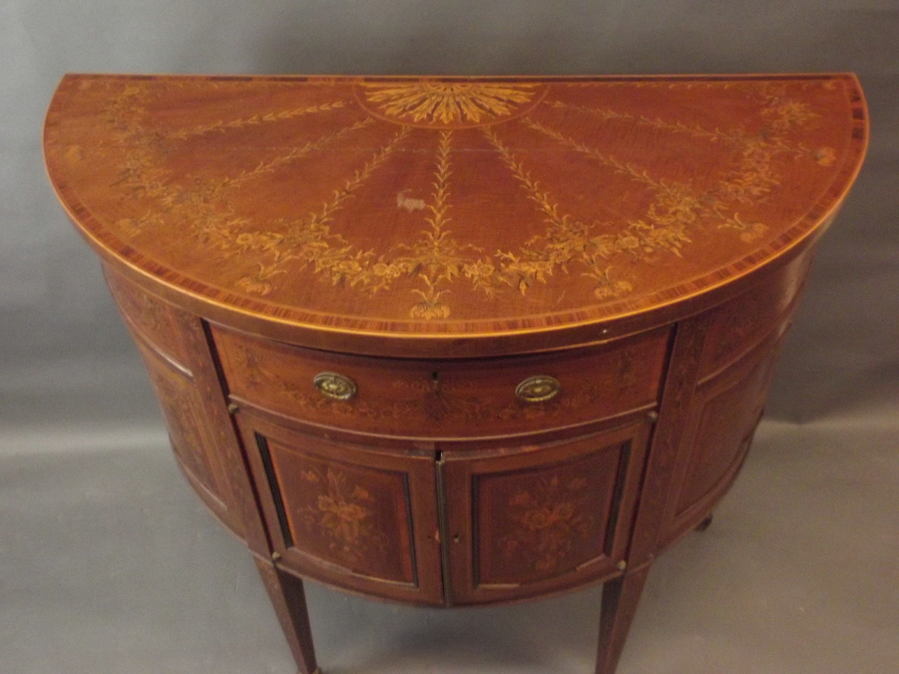A C19th figured mahogany demi-lune side cabinet with Adam style penwork inlaid decoration of - Image 2 of 5