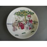 A Chinese polychrome enamel porcelain dish decorated with gentlemen playing board games, 4 character