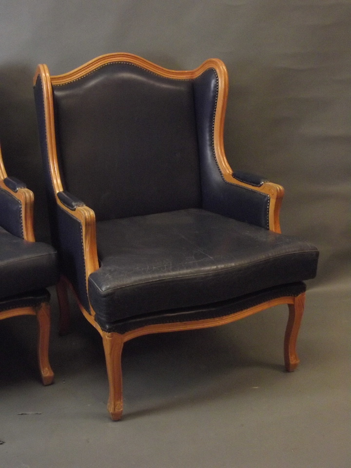 A pair of French style beech wood framed winged armchairs with leather cushions and upholstery - Image 2 of 2