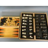 A complete chess set in a fitted box, and another smaller set, king 3" high
