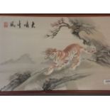 An Oriental gilt thread silk embroidery, tiger in a mountain landscape, early to mid C20th, 13" x