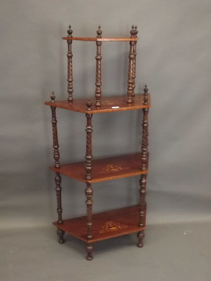 A Victorian four tier inlaid walnut whatnot on carved and turned supports, 27" x 11" x 53½"