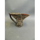 A Chinese carved horn libation cup decorated with a bamboo forest, 4" high
