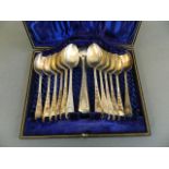 A set of twelve Hallmarked silver tea spoons and sugar tongs by 'James Dixon & Sons', 1895/96, in