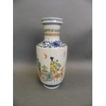 An early Chinese famille verte enamel porcelain vase decorated with four travellers and a deer in