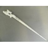 A Chinese white jade hairpin with pierced spiral decoration to stem and carved dragon handle, 9½"